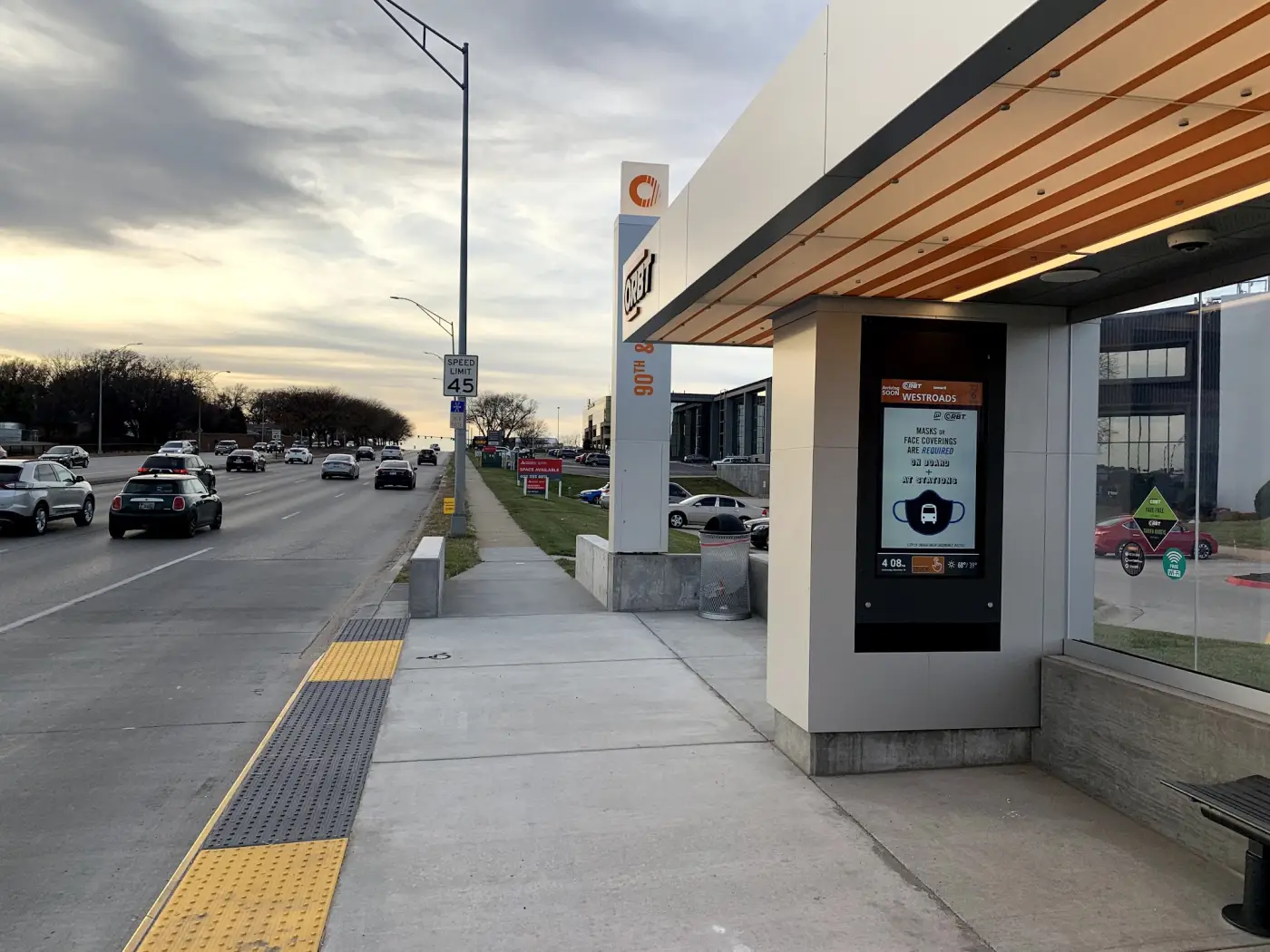 A ruggedized outdoor display running live rider information at a BRT shelter, designed, deployed, and monitored end to end by MPM.